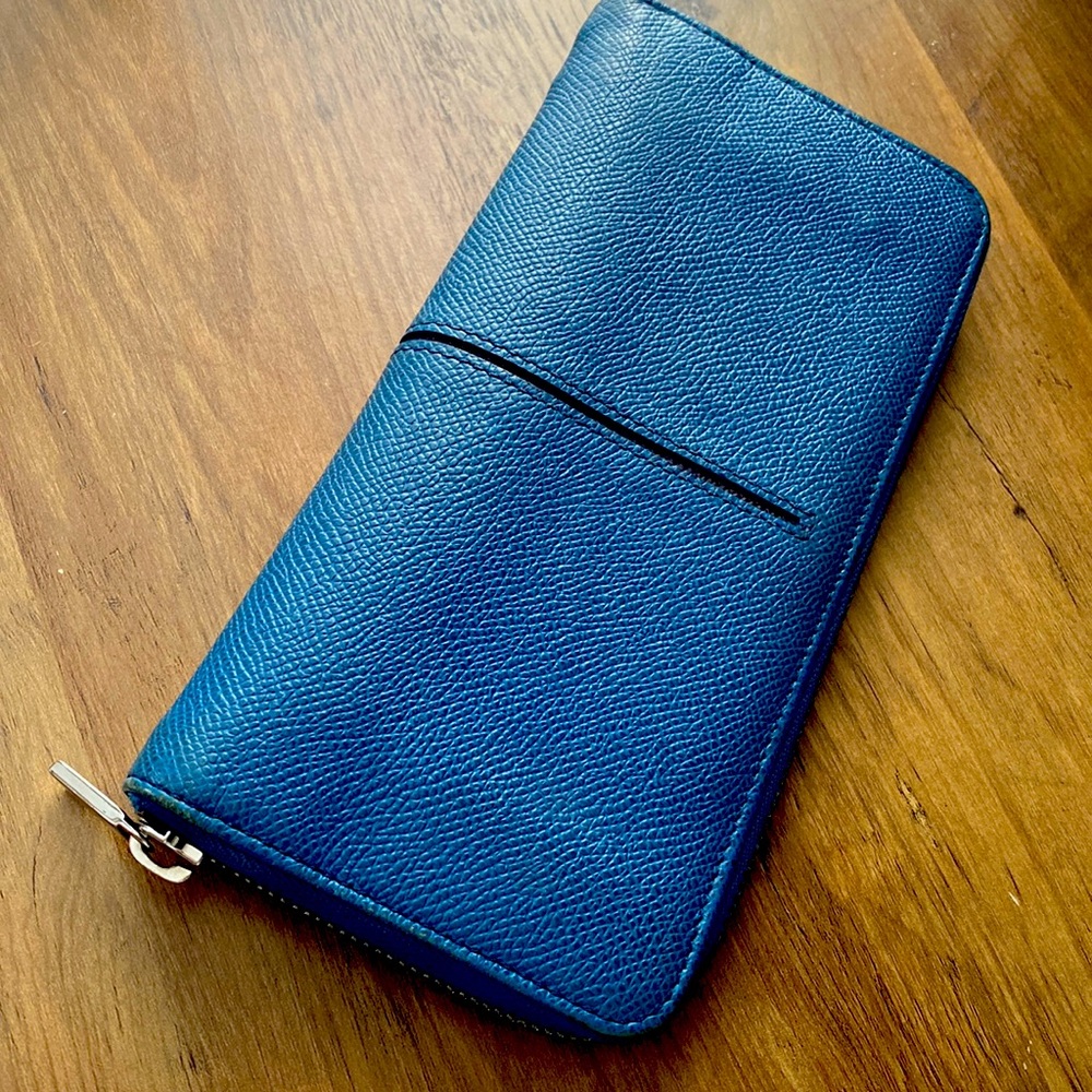 Excellent used condition royal blue zipper wallet from Tods.